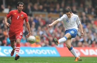 26.03.11 - Wales v England - Euro 2012 Qualifier - Stewart Downing of England tries a shot at goal. 