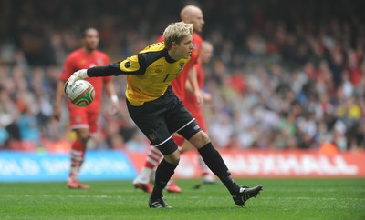 26.03.11 - Wales v England - Euro 2012 Qualifier - Wayne Hennessey of Wales gets the ball away. 