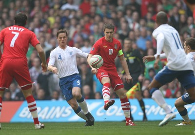 26.03.11 - Wales v England, UEFA Euro 2012 Qualifier -  Wales' Aaron Ramsey is challenged by England's Scott Parker  