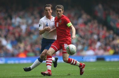 26.03.11 - Wales v England, UEFA Euro 2012 Qualifier -  Wales' Aaron Ramsey holds off England's Scott Parker  