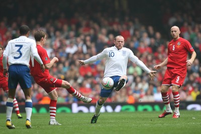 26.03.11 - Wales v England, UEFA Euro 2012 Qualifier -  England's Wayne Rooney plays the ball forward  