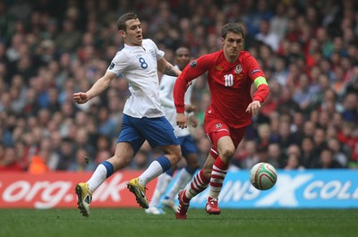 26.03.11 - Wales v England, UEFA Euro 2012 Qualifier -  Wales' Aaron Ramsey gets past England's Jack Wilshere  