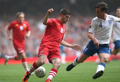 26.03.11 - Wales v England, UEFA Euro 2012 Qualifier -  Wales' Ched Evans takes on England's Scott Parker  