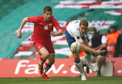 26.03.11 - Wales v England, UEFA Euro 2012 Qualifier -  Wales' Ched Evans and England's Scott Parker compete for the ball 