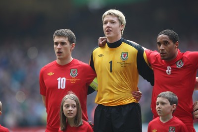 26.03.11 - Wales v England, UEFA Euro 2012 Qualifier -  Wales' captain Aaron Ramsey leads the signing of the Welsh National Anthem 