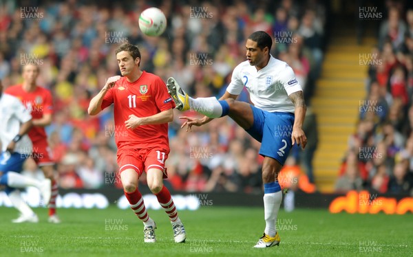 26.03.11 - Wales v England - Euro 2012 Qualifier - Glen Johnson of England is challenged by Andy King of Wales. 