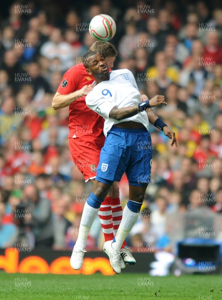 26.03.11 - Wales v England - Euro 2012 Qualifier - Darren Bent of England and Danny Collins of Wales compete. 