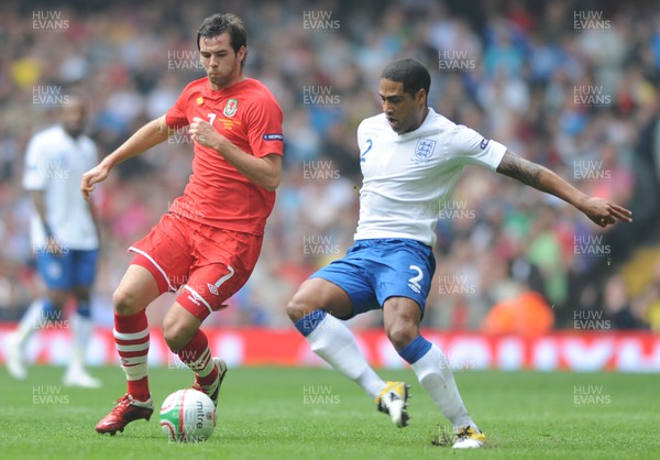 26.03.11 - Wales v England - Euro 2012 Qualifier - Joe Ledley of Wales and Glen Johnson of England compete. 