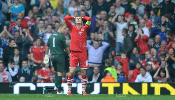 26.03.11 - Wales v England - Euro 2012 Qualifier - Aaron Ramsey of Wales showsh is frustration after missing a shot at goal. 