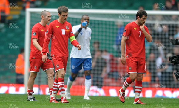 26.03.11 - Wales v England - Euro 2012 Qualifier - Andrew Crofts, Aaron Ramsey and Joe Ledley of Wales look dejected at the end of the game. 