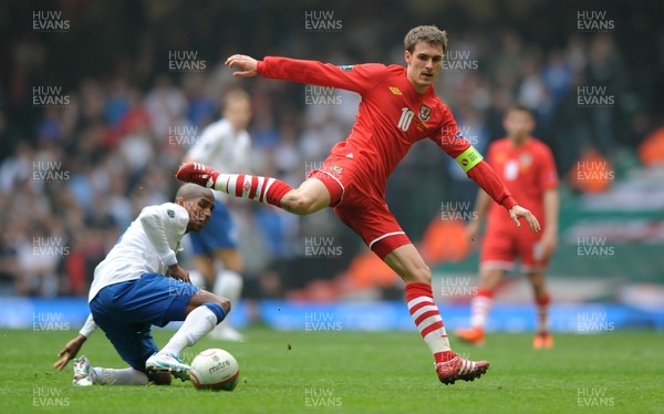 26.03.11 - Wales v England - Euro 2012 Qualifier - Aaron Ramsey of Wales is tackled by Ashley Young of England. 