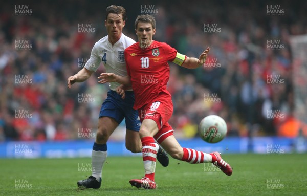 26.03.11 - Wales v England, UEFA Euro 2012 Qualifier -  Wales' Aaron Ramsey holds off England's Scott Parker  