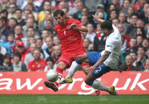 26.03.11 - Wales v England, UEFA Euro 2012 Qualifier -  Wales' Joe Ledley is challenged by England's Glen Johnson  
