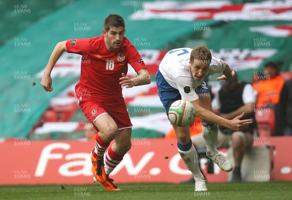 26.03.11 - Wales v England, UEFA Euro 2012 Qualifier -  Wales' Ched Evans and England's Scott Parker compete for the ball 
