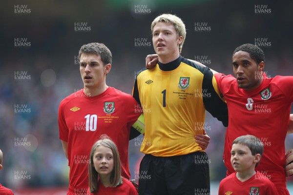 26.03.11 - Wales v England, UEFA Euro 2012 Qualifier -  Wales' captain Aaron Ramsey leads the signing of the Welsh National Anthem 