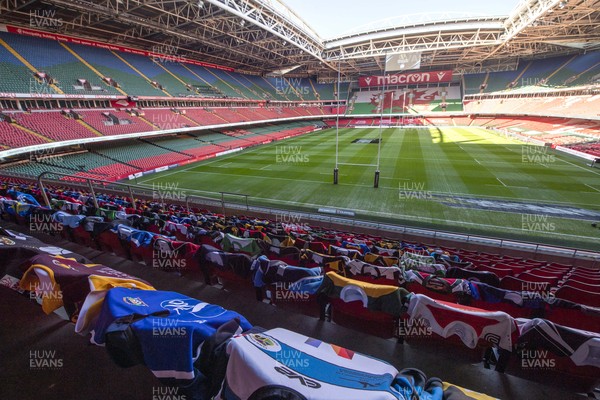 270221 - Wales v England - Guinness Six Nations - 250 Welsh rugby club jerseys sit on the seats at Principality Stadium ahead of kick off