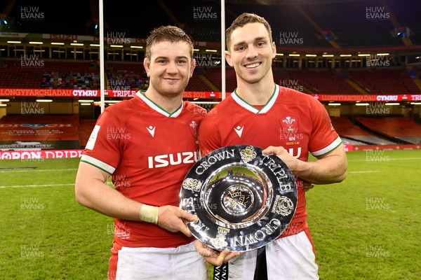 270221 - Wales v England - Guinness Six Nations - Rhodri Jones and George North of Wales celebrate with the triple crown