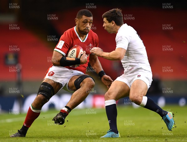 270221 - Wales v England - Guinness Six Nations - Taulupe Faletau of Wales is tackled by Ben Youngs of England