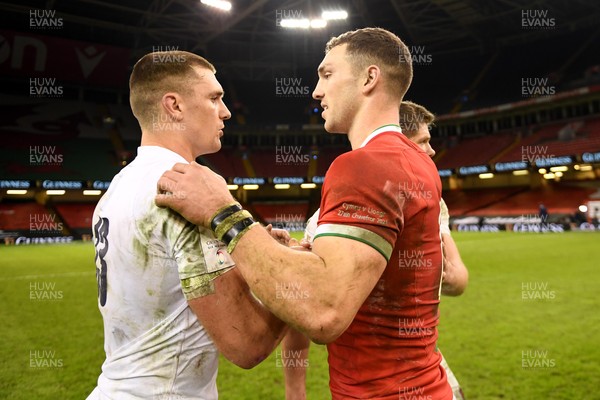 270221 - Wales v England - Guinness Six Nations - Henry Slade of England and George North of Wales at the end of the game