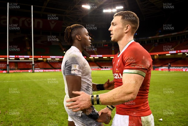 270221 - Wales v England - Guinness Six Nations - Maro Itoje of England and George North of Wales at the end of the game