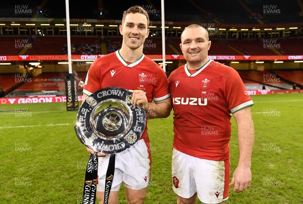 270221 - Wales v England - Guinness Six Nations - George North and Ken Owens of Wales with the triple crown trophy at the end of the game