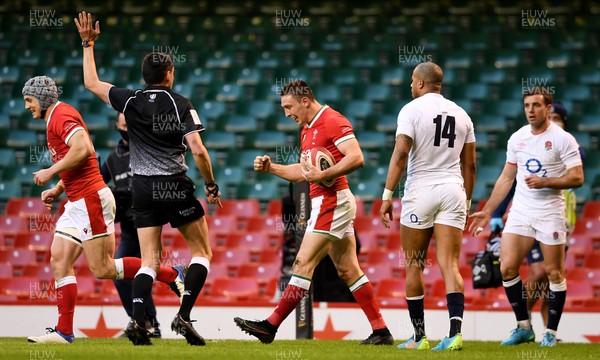 270221 - Wales v England - Guinness Six Nations - Josh Adams of Wales celebrates scoring try