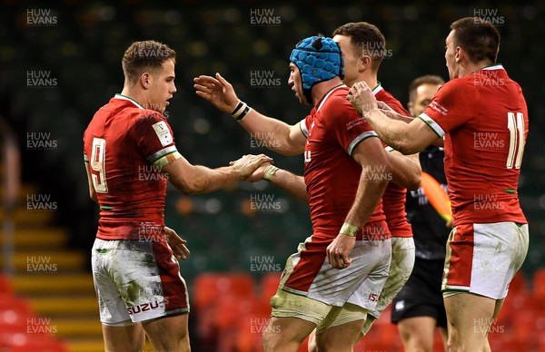 270221 - Wales v England - Guinness Six Nations - Kieran Hardy of Wales celebrates scoring try with team mates