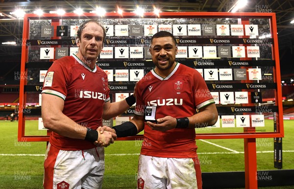 270221 - Wales v England - Guinness Six Nations - Alun Wyn Jones of Wales presents Taulupe Faletau of Wales with his player of the match award