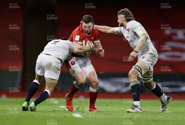 270221 - Wales v England - Guinness 6 Nations - George North of Wales is tackled by Jamie George and Jonny Hill of England