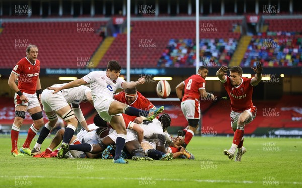 270221 - Wales v England, Guinness 2021 Six Nations Championship - Kieran Hardy of Wales attempts to charge down a kick by Ben Youngs of England