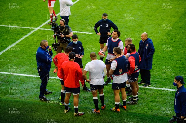270221 - Wales v England - Guinness Six Nations - Referee Pascal Gauzere talks to the England forwards prior to the game