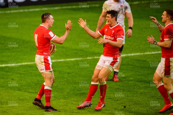 270221 - Wales v England - Guinness Six Nations - Josh Adams of Wales celebrates his try with Louis Rees-Zammit