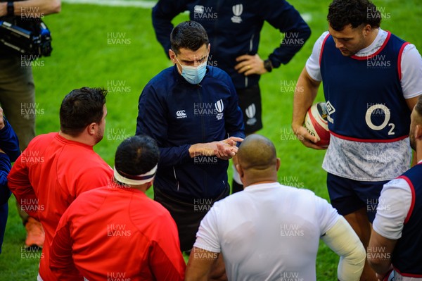 270221 - Wales v England - Guinness Six Nations - Referee Pascal Gauzere talks to the English forwards prior to kick off