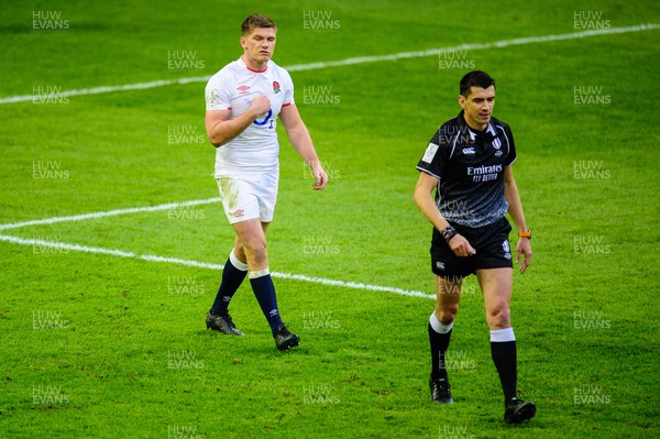 270221 - Wales v England - Guinness Six Nations - Owen Farrell of England talks to Referee Pascal Gauzere 