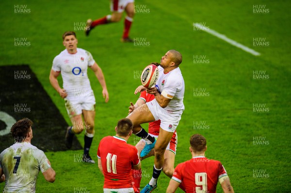 270221 - Wales v England - Guinness Six Nations - Anthony Watson of England wins the high ball
