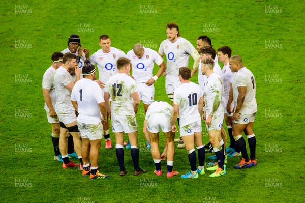270221 - Wales v England - Guinness Six Nations - Owen Farrell of England talks to his players in huddle