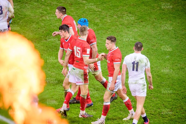 270221 - Wales v England - Guinness Six Nations - Wales players congratulate Kieran Hardy of Wales after his try