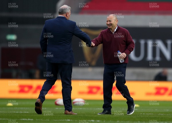 281120 - Wales v England - Autumn Nations Cup 2020 - Wales Head Coach Wayne Pivac and England Head Coach Eddie Jones bumps fists during the warm up