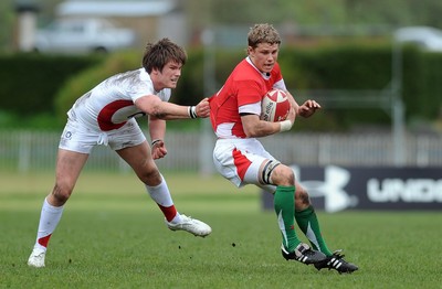 26.04.09 - Under 18 Six Nations Rugby -  Wales  England -  Wales' Thomas Young tries to get past Owen Farrell
