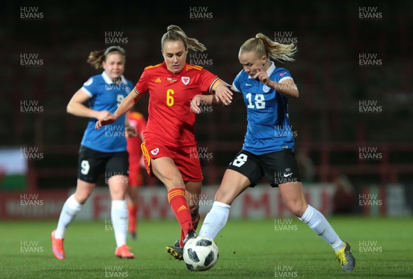 060320 - Wales v Estonia - Women's International Friendly - Josie Green of Wales is tackled by Kethy Oumpuu