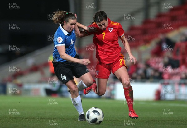 060320 - Wales v Estonia - Women's International Friendly - Megan Wynne of Wales is tackled by Pille Raadik