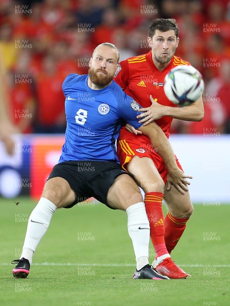 080921 - Wales v Estonia, World Cup 2022 Qualifying - Henri Anier of Estonia is challenged by Ben Davies of Wales