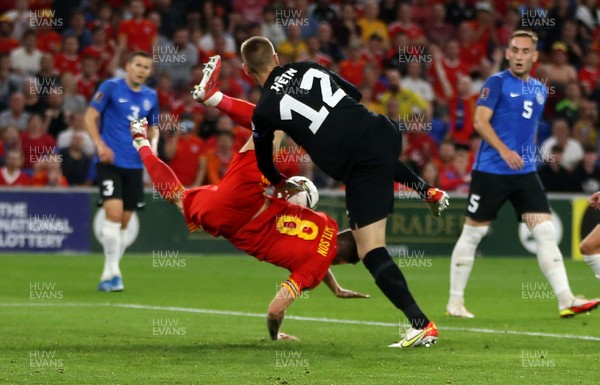 080921 - Wales v Estonia, World Cup 2022 Qualifying - Harry Wilson of Wales collides with Estonia goalkeeper Karl Hein
