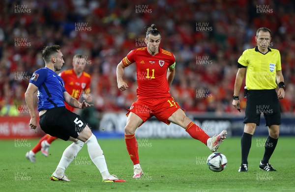 080921 - Wales v Estonia, World Cup 2022 Qualifying - Vladislav Kreida of Estonia is tackled by Gareth Bale of Wales