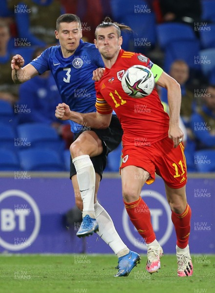 080921 - Wales v Estonia, World Cup 2022 Qualifying - Gareth Bale of Wales is challenged by Artur Pikk of Estonia