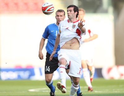 29.05.09 - Wales v Estonia, International Friendy, Llanelli -  Wales' Joe Ledley wins the ball from Estonia's Konstantin Vassiljev  