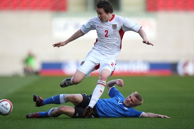 29.05.09 - Wales v Estonia, International Friendy, Llanelli -  Wales' Chris Gunter is tackled by Estonia's Igor Morozov  