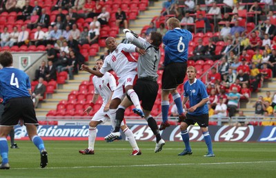 29.05.09 - Wales v Estonia, International Friendy, Llanelli -  Wales' Robert Earnshaw    tangles with Estonia's keeper Artur Kotenko  