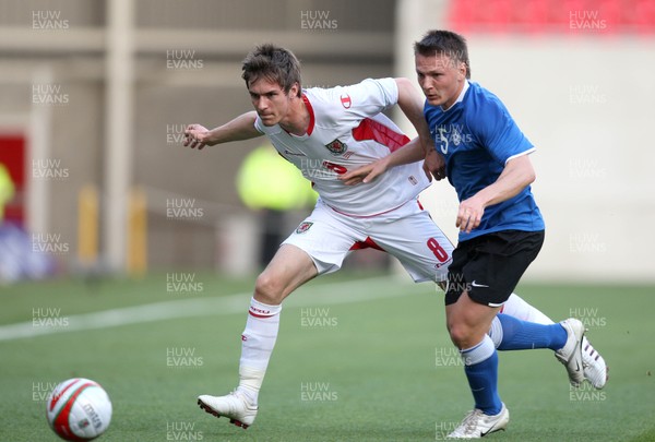 29.05.09 - Wales v Estonia, International Friendy, Llanelli -  Wales' Aaron Ramsey tangles with Estonia's Dmitri Kruglov  