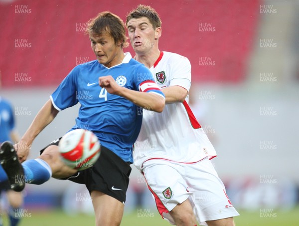 29.05.09 - Wales v Estonia, International Friendy, Llanelli -  Wales' Sam Vokes challenges Estonia's Alo Barengrub  